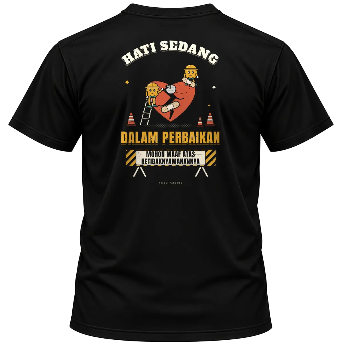 Mockup kaos hitam Kreasi Pandawa tampak belakang, sablon punggung: Hati sedang dalam perbaikan, mohon maaf atas ketidaknyamanannya